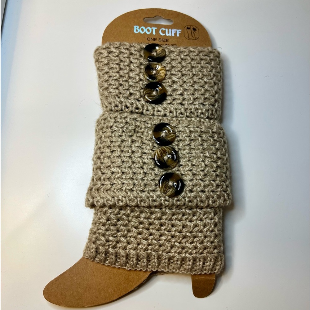 NWT  Brand new. Never worn. Beige/tan Boot Cuff set. One size.
